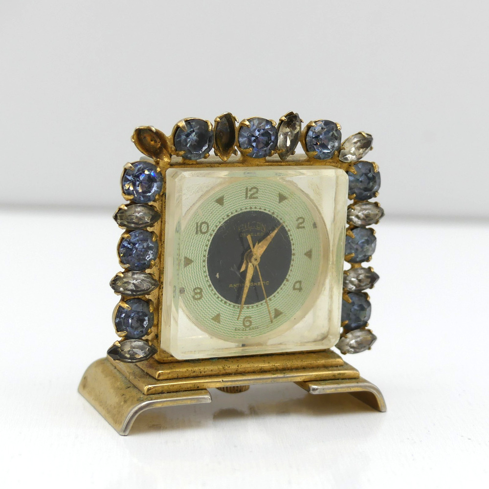 VTG Hilton Jeweled Antimagnetic Mini Skeleton Desk Clock Gold Tone Swiss Quartz
